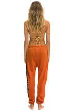 Retro UNIVERSITY OF TEXAS UNISEX CIRCLE PRINT SWEATPANTS - BURNT ORANGE