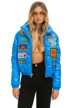 Retro VINTAGE PATCH APRES PUFFER JACKET - BLUE CINA GLOSSY