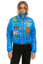 Retro VINTAGE PATCH APRES PUFFER JACKET - BLUE CINA GLOSSY